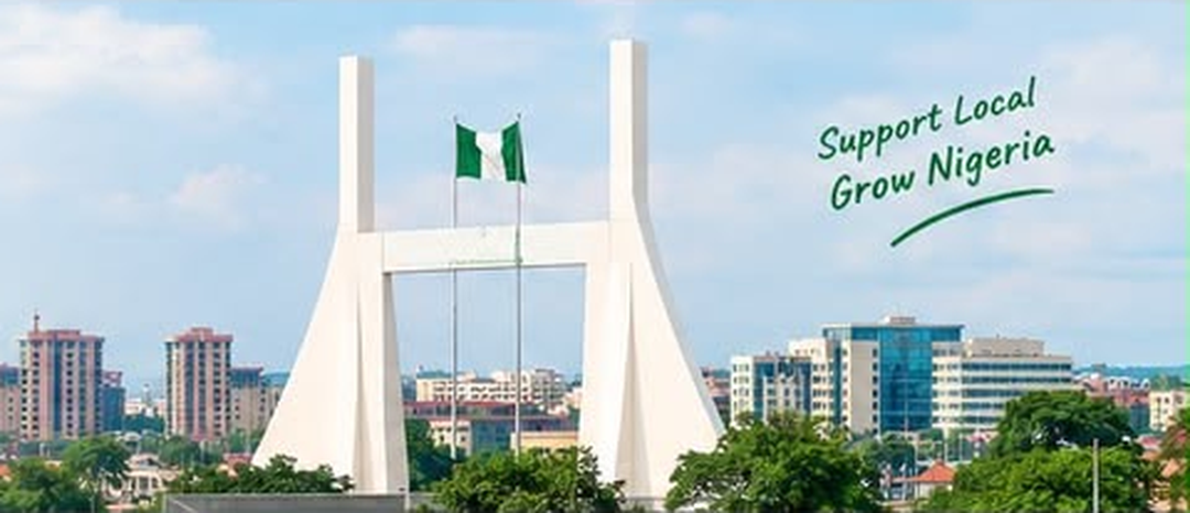 The Abuja city gate monument with Nigerian flags